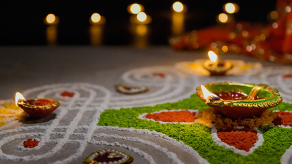 Clay diya lamps lit during diwali celebration, Diwali, or Deepavali, is India's biggest and most important holiday. - 778717196