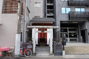 Small shrine in quiet neighborhood in Tokyo, Japan on February 15, 2024