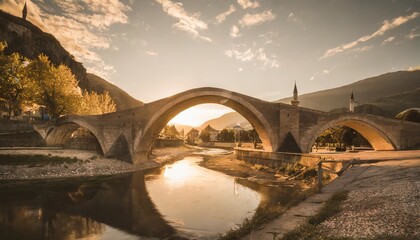 the ancient sacred bridge in gjakova kosovo in the evening hours - obrazy, fototapety, plakaty