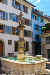 Fototapeta premium Napfbrunnen fountain on Napfplatz in Old Town of Zurich, Switzerland