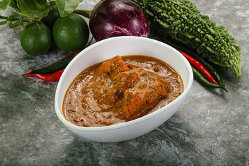 Indian cuisine - chicken curry with spices