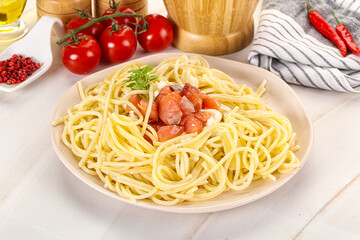 Pasta spaghetti with salmon and stracciatella