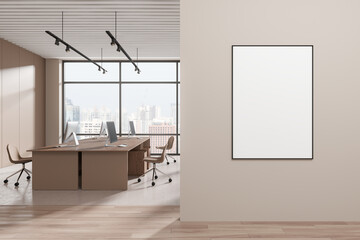 Beige open space office interior with poster