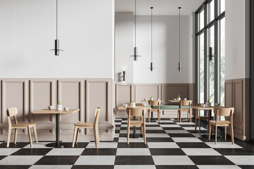 Classic modern cafe interior with chairs and tables in row, panoramic window