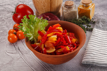 Diced raw bell red and yellow pepper