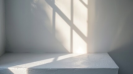 sunlight falling on a white wall
