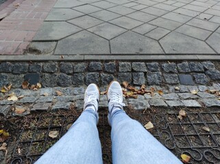 feet on the pavement