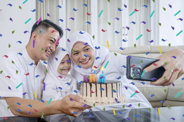 happy muslim family celebrating birthday