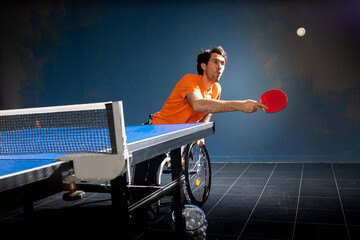 A paraplegic plays table tennis