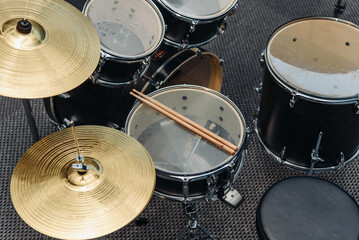 Fototapeta na wymiar wooden drumsticks on drum set