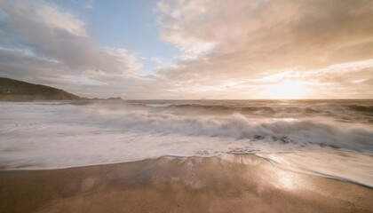 Fototapeta na wymiar slow motion shot of waves crashing on a sandy beach