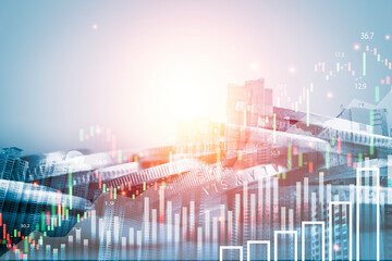Double exposure of coin stacking and cityscape with stock market graph chart for financial business...