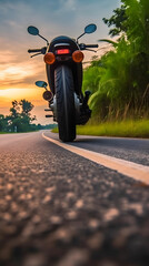 Close-Up of a Cycle on the Road at Sunrise in Malaysia.