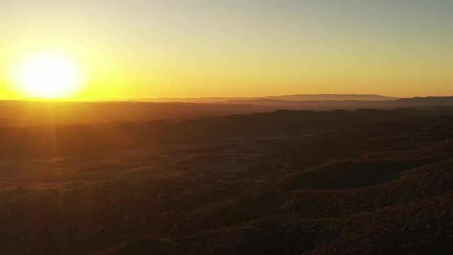 Sunrise in Wilpena Pound rock Formation of Flinders Ranges, South Australia, 4k.
