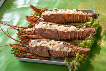 Thai sea food - Baked Lobster with Cheese Grilled Lobster and Cheese Organized in blue and placed...