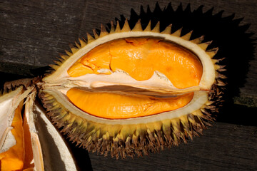 Closeup View of Opened Durian Fruit on an Old Slatted Boardwalk in Sarawak Borneo Malaysia - 778834713