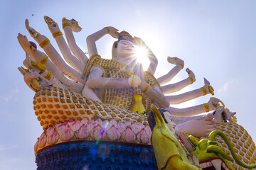 Majestic Multi-Armed Statue in Thailand Under the Sun