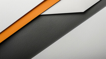 Abstract geometric paper art with orange and grey tones.