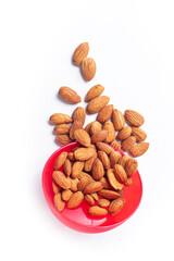 Falling almond isolated on white background with clipping path. Healthy food concept.