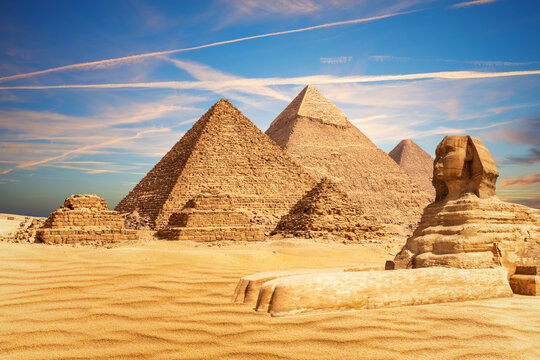 The Great Sphinx bythe Pyramids of Egypt and its companions in the sands of Giza desert, Egypt