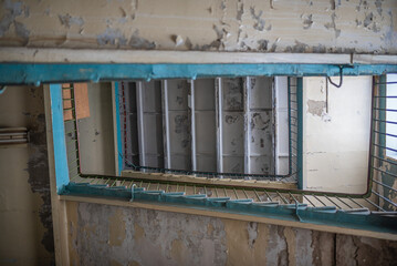 Old stairs of abandoned factory background.