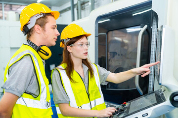Manufacturing industry factory manufacturing technology concept. Caucasian man and woman engineer...