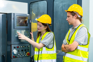 Manufacturing industry factory manufacturing technology concept. Caucasian man and woman engineer...