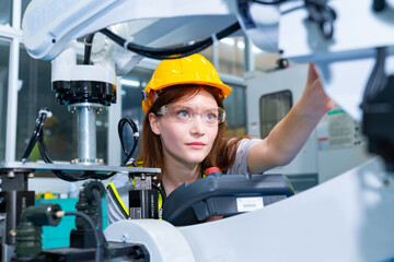 Manufacturing industry factory manufacturing technology concept. Professional woman technician...