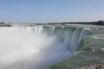 Dramatic Niagara Falls Canadian side on a sunny day