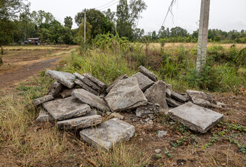 A view of the rubble of concrete blocks that were demolished from a road.