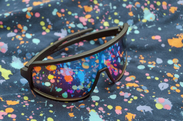 sports glasses for running on a colored background