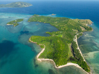Top view of Cabangajan Island with white sandy beach. Santa Fe, Tablas, Romblon. Philippines.