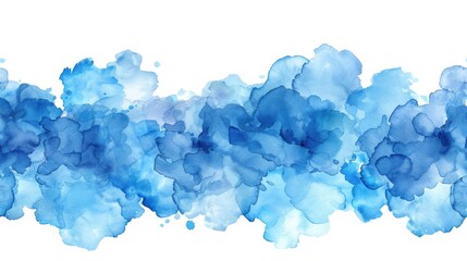Blue watercolor paint spreading on a white surface