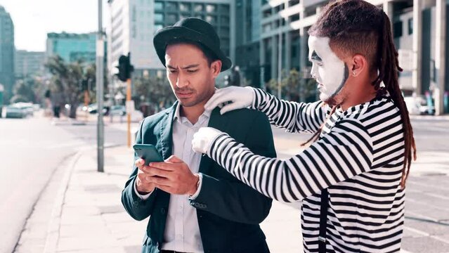 Man, phone or mime on street as anxiety, frustration or thinking of difficult, work or communication. Businessman, hat or tech as stress, crazy actor or april fool performance on morning commute