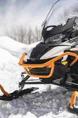 snowmobile in the winter mountains - 778950761