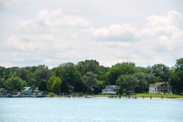 row of cottages on stag island on the st clair river ontario - 778954153