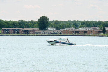 small runabout boat on st clair river ontario - 778954393