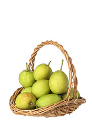 A basket of green fresh fruit pears
