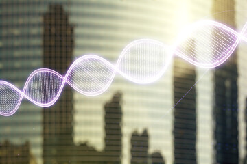 Double exposure of creative DNA hologram on modern skyscrapers background. Bio Engineering and DNA...