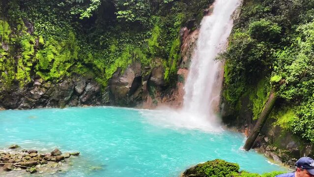 4K video of Rio Celeste, waterfall and blue pond in Tenor Volcano National park in Costa Rica.