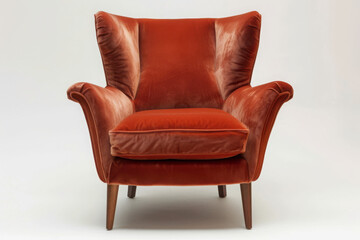 Rust velvet wingback chair isolated on white