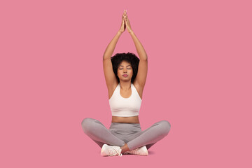 Woman meditating in a peaceful pose