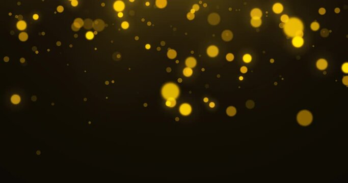 Golden luxury bokeh on particles floating in the air. Dust and glitter particles background. Black background , Use blending mode screen. Loop Animation