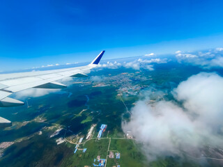 Fototapeta premium A Spectacular Cloudscape Through the Aircraft Window