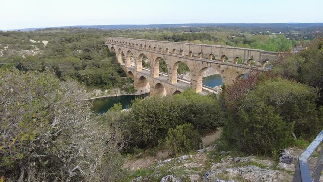 Scenic view of the historic Pont du Gard, a UNESCO world heritage Roman aqueduct located in Provence, near Nimes in France.