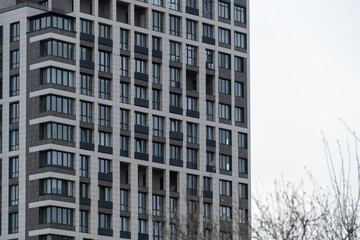 Fototapeta premium Geometry modern of apartment building exterior. Architectural details of luxury house and home complex. Fragment contemporary residential condominium. New multistorey skyscrapers in business district.