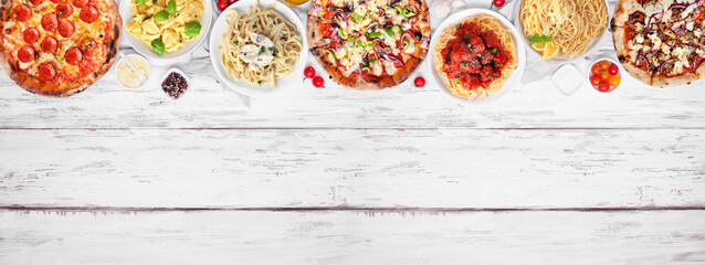 Delicious Italian food top border. Variety of pizzas and pastas. Above view on a white wood banner background. Copy space.