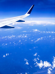 Fototapeta premium A Spectacular Cloudscape Through the Aircraft Window