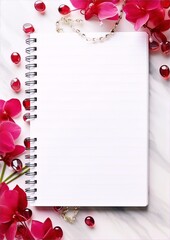 Elegant minimal composition of orchid flowers, golden chain and notebook on marble background.