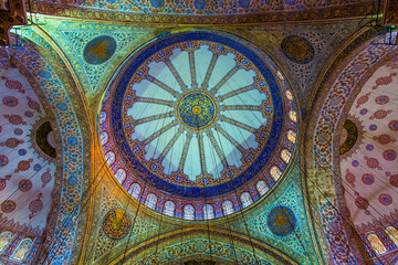 Istanbul, Turkey - March 23 2014: The splendid mosaic tiles decorated dome in Blue Mosque in Istanbul